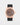 2023 Rolex Sky-Dweller 42 326235 watch featuring a chocolate brown dial, 18k Everose gold fluted Ring Command bezel, and black Oysterflex strap isolated on a light gray background