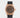 2023 Rolex Sky-Dweller 42 326235 watch featuring a chocolate brown dial, 18k Everose gold fluted Ring Command bezel, and black Oysterflex strap isolated on a light gray background