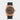 2023 Rolex Sky-Dweller 42 326235 watch featuring a chocolate brown dial, 18k Everose gold fluted Ring Command bezel, and black Oysterflex strap isolated on a light gray background