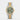 Brand new 2026 Rolex Datejust 36 126233 watch featuring an olive green Roman numeral dial, 18k yellow gold fluted bezel and two tone Jubilee bracelet isolated on a light gray studio background