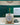 Rolex Datejust Oyster Perpetual watch with a two-tone steel and gold bracelet, silver dial, and gold-tone bezel, displayed in its original green Rolex presentation box with documents and a wax seal.