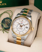 Two Tone Yellow Gold Rolex Sky Dweller 326933 White Dial Watch at Marc Samuels Jewelers Dallas