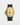 Rear perspective of the Breitling Superocean Automatic 42 N17375201L1S1 showing the solid case back, green rubber strap, and bronze folding clasp