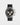 Front view of a pre-owned 2025 Rolex Cosmograph Daytona 126519LN in 18k white gold featuring a black diamond-set dial, black Cerachrom bezel, and Oysterflex strap at Marc Samuels Jewelers in Dallas
