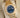 angled view of an 18k yellow gold Rolex Yacht-Master 16628 showing the sandblasted gold bezel with raised polished numerals on a presentation cushion