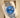 Side-angle view of a new all-steel 41mm Oystersteel watch housing a deep blue metallic dial and an un-fluted mirror-polished bezel ring on a cream display pad