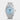 A pre owned 37mm Tudor Black Bay 54 highlighting its unique sand-textured Lagoon Blue face and a mirror-polished steel relief bezel, on display at Marc Samuels Jewelers